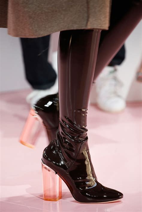 dior hesls|Dior high heel boots.